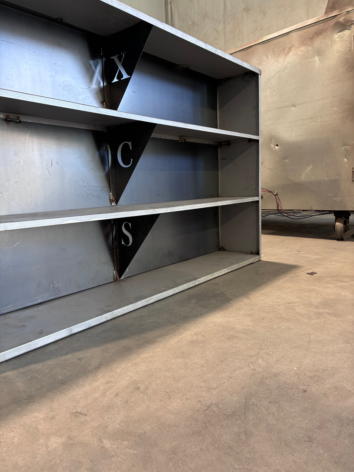 Custom steel shelving with lettering
